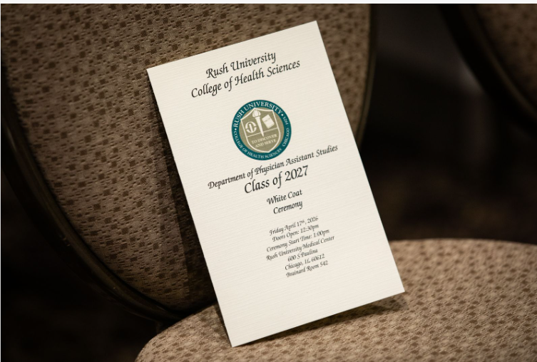 RUSH University College of Health Sciences White Coat Ceremony program booklet resting on a chair — designed in-house